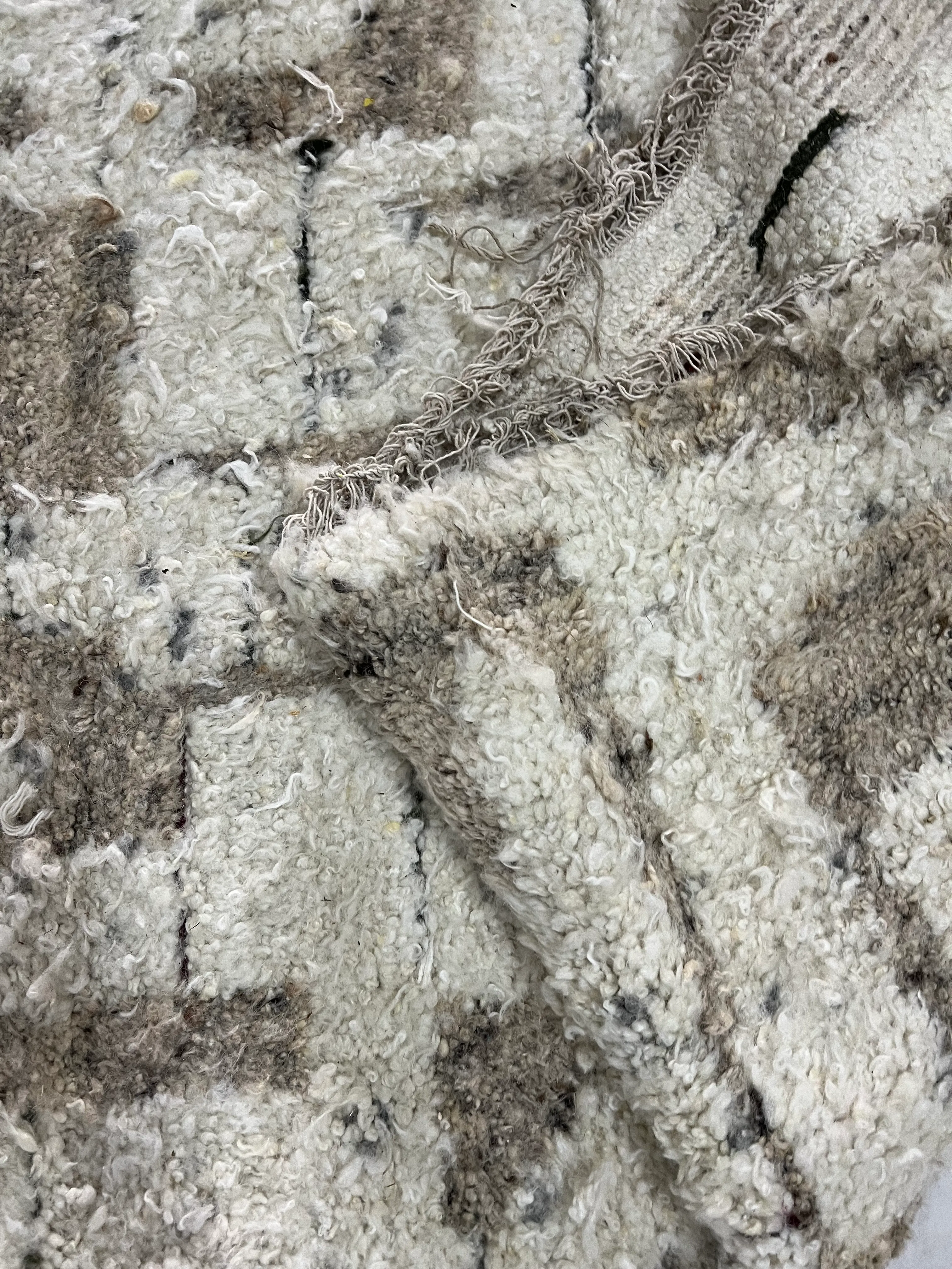Artisan process inside the family-owned rug mill
