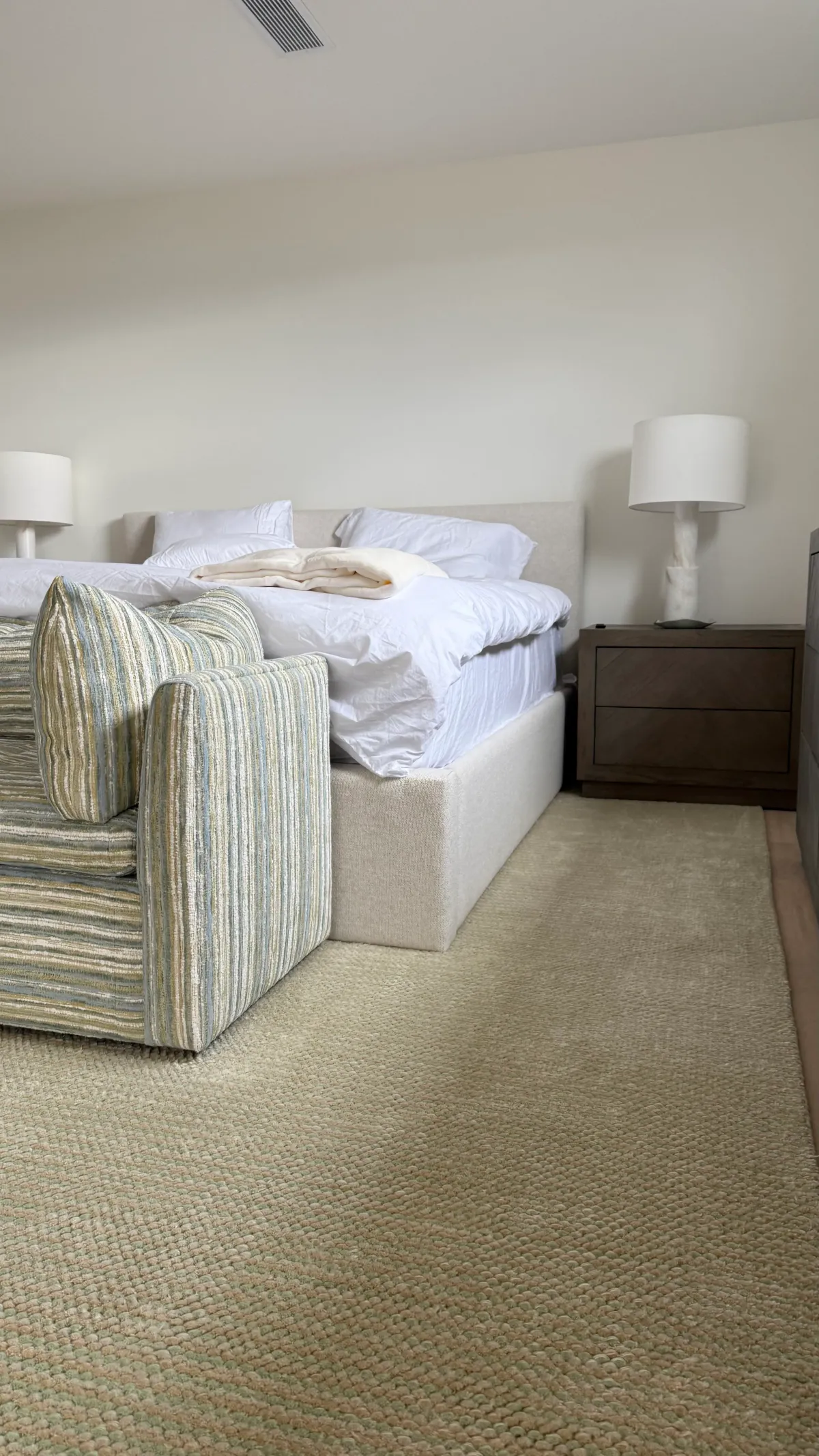 A handcrafted rug in an interior setting.