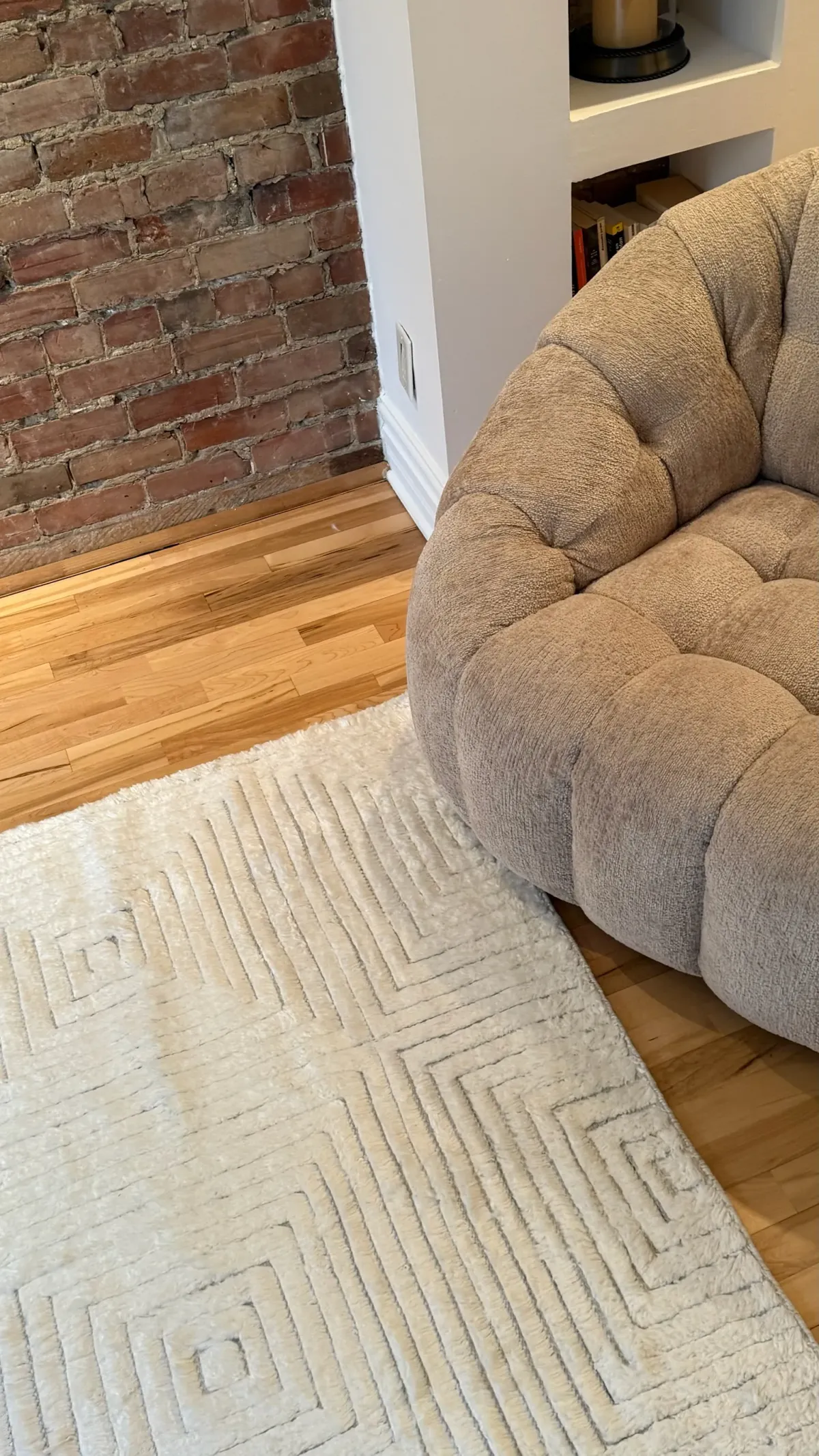 A handcrafted rug in an interior setting.