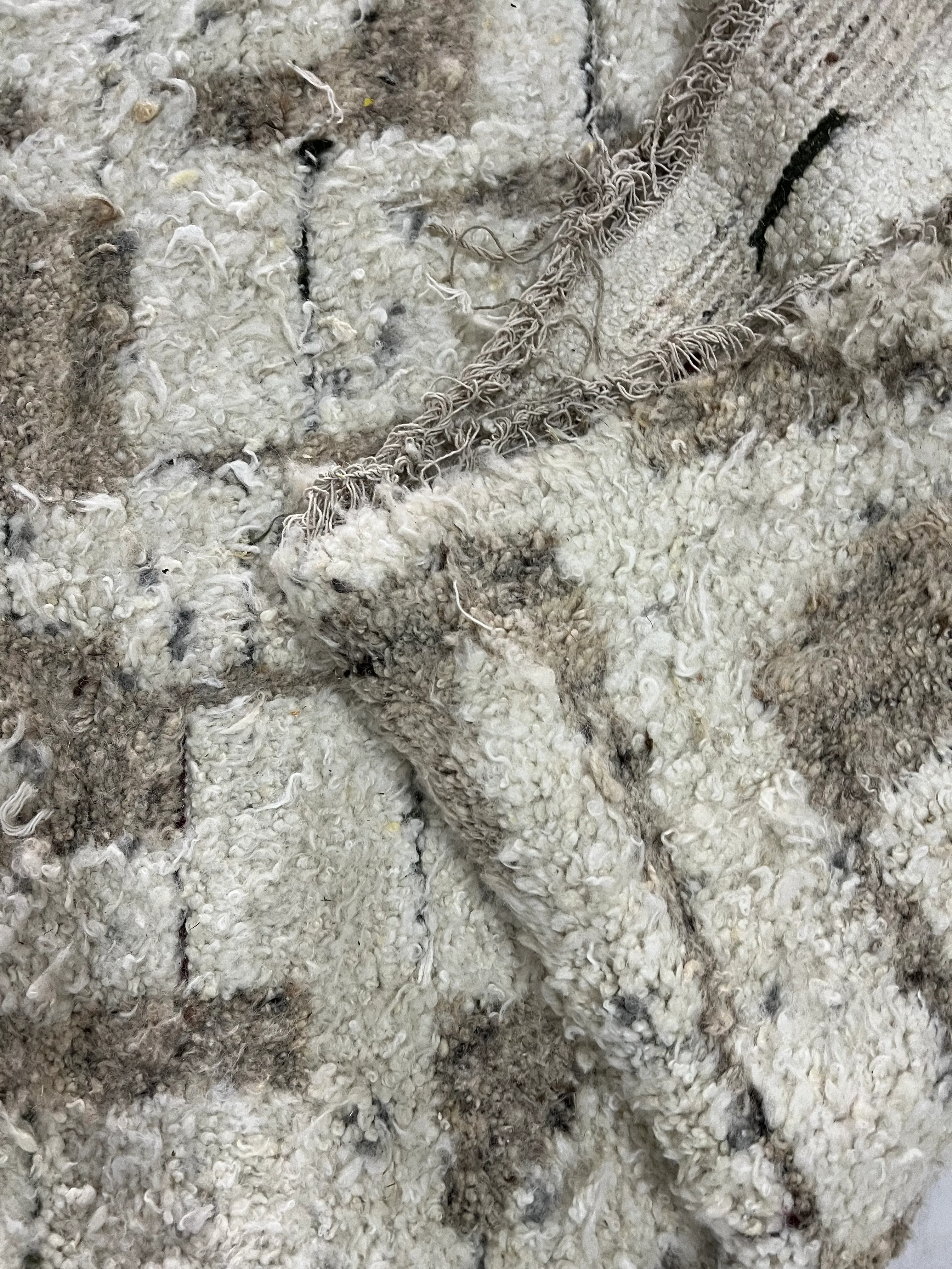 Artisan process inside the family-owned rug mill